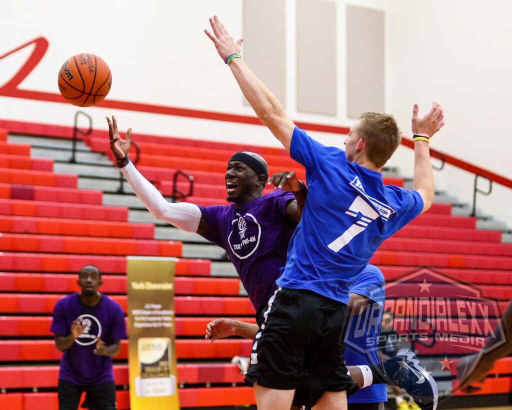 Tim Chatman (WTPA) shooting around Connor Martin (Yark Chevy Boyz)